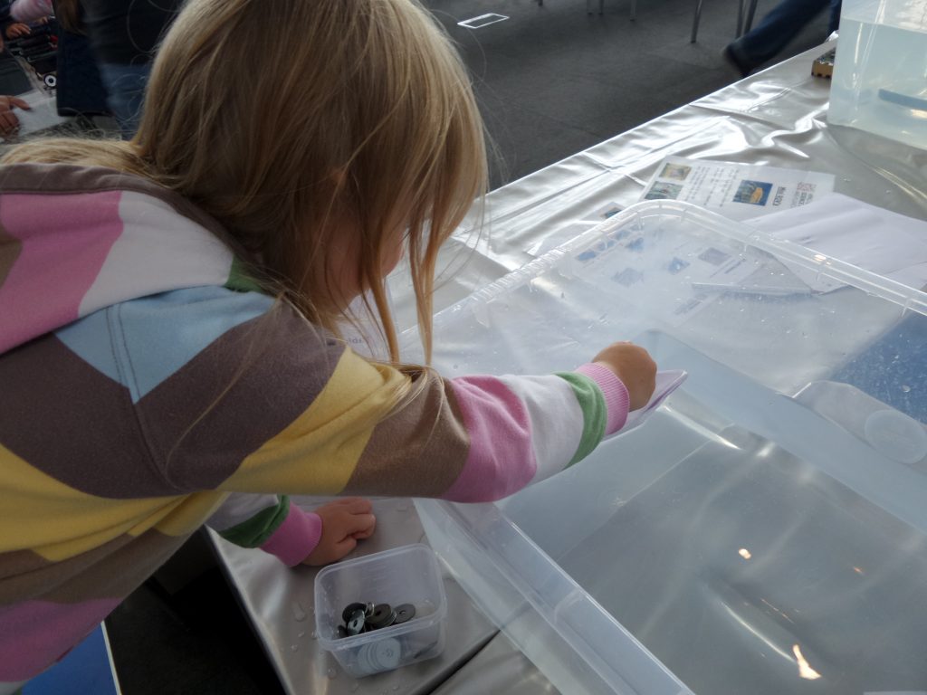 Lois doing a floating experiment at Winchester science centre