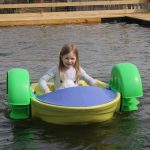 paddle boats on water