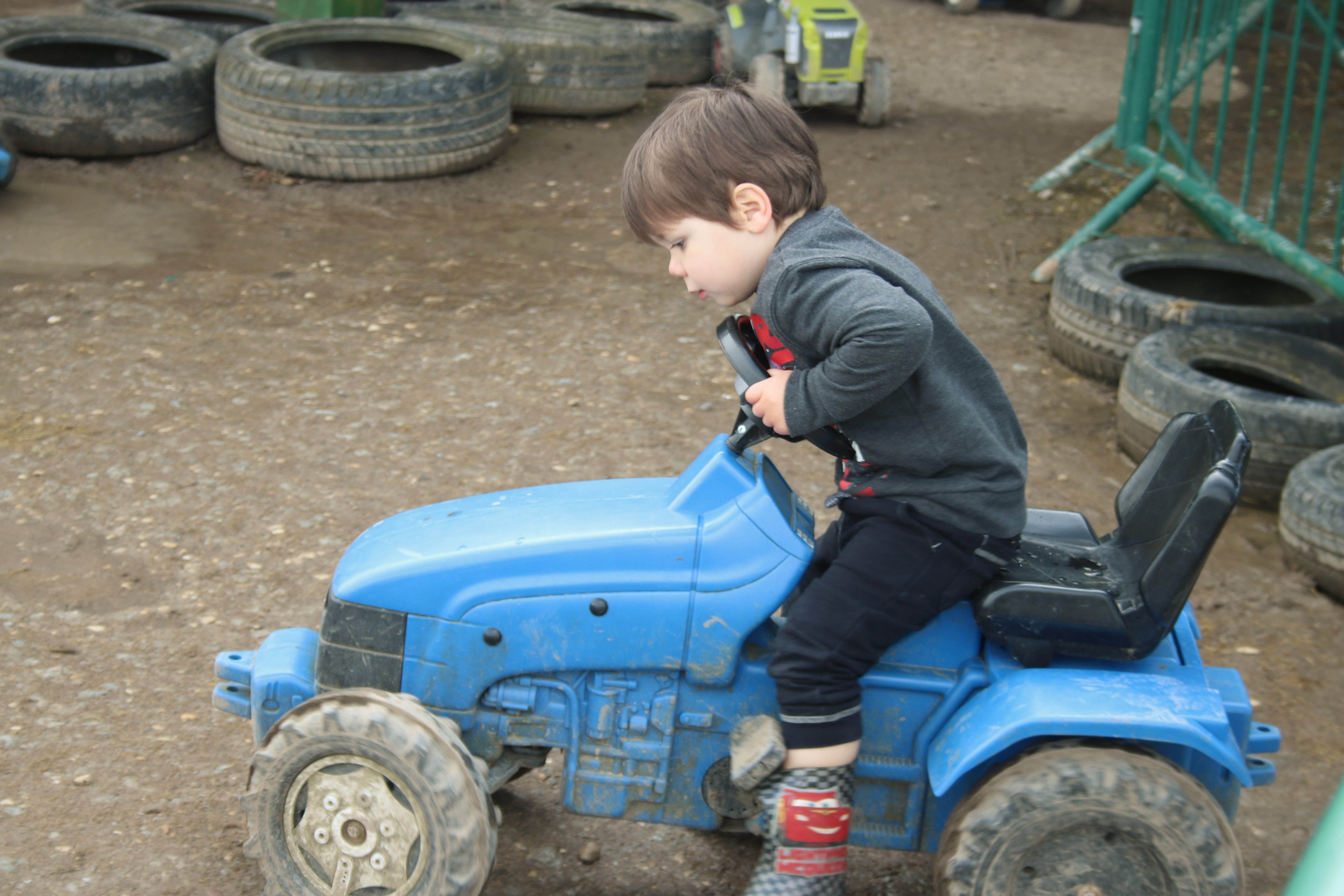 ride on tractor toy at farmer gows