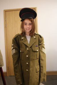 Lilian wearing an old army uniform