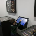 interactive screen surrounded by military medals