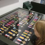 medals in display cabinet