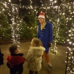 Walkway to Santa's grotto lit with fairy lights