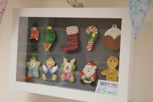 Christmas decoration ornaments painted in display case