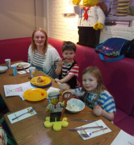 katie and kids eating in the Bricks restaurant