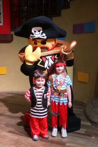 kids with lego pirate character at legoland hotel