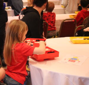 building lego at a table