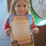 lois holding her pirate treasure trail map at the legoland hotel