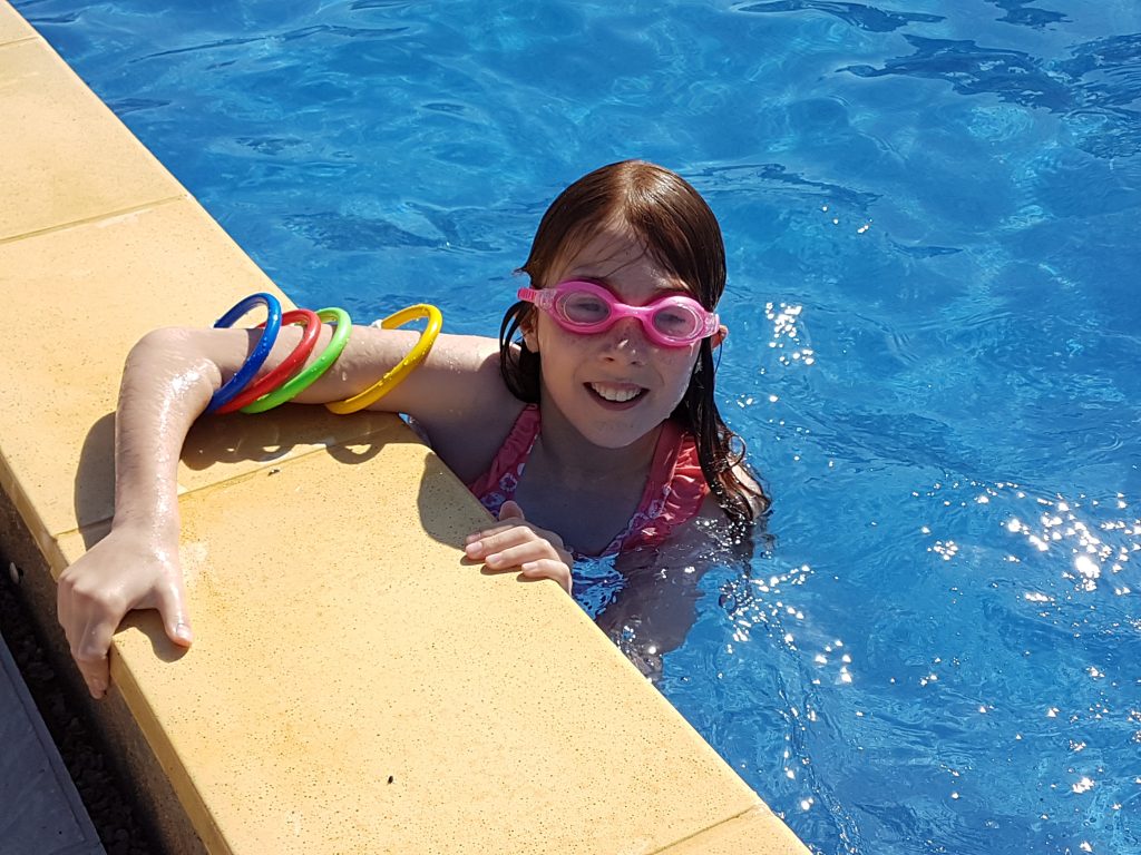 Lily in the pool with sinkers