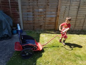 Boy pulling the yippie yo crossbuggy