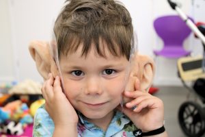 Boy wearing BFG ears