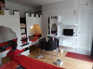 Breakfast table and chairs in family room suite