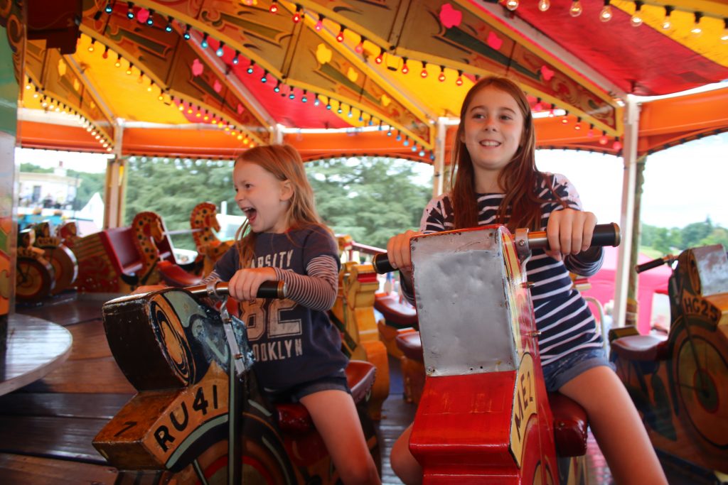 Girls on the vintage fun fair
