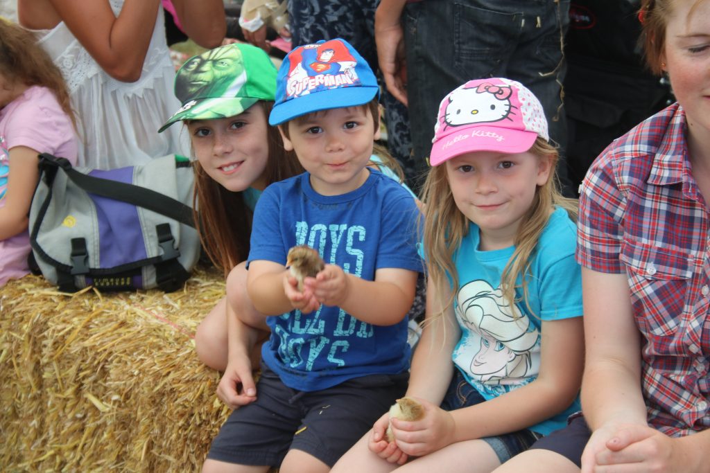 Cody holding a chick at BBC Countryfile Live