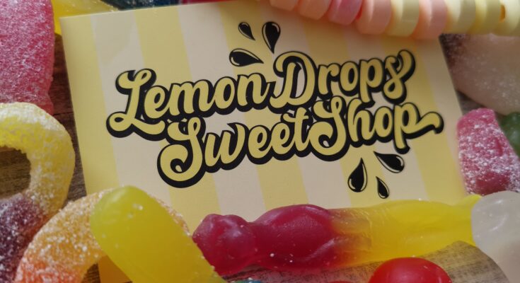 Lemon Drops Sweet Shop business card surrounded by sweets