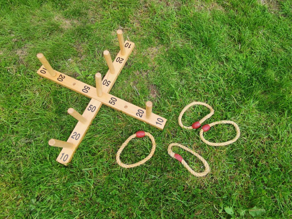 wooden ring toss game on grass