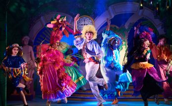 Actors dancing on stage at The Theatre Chipping Norton