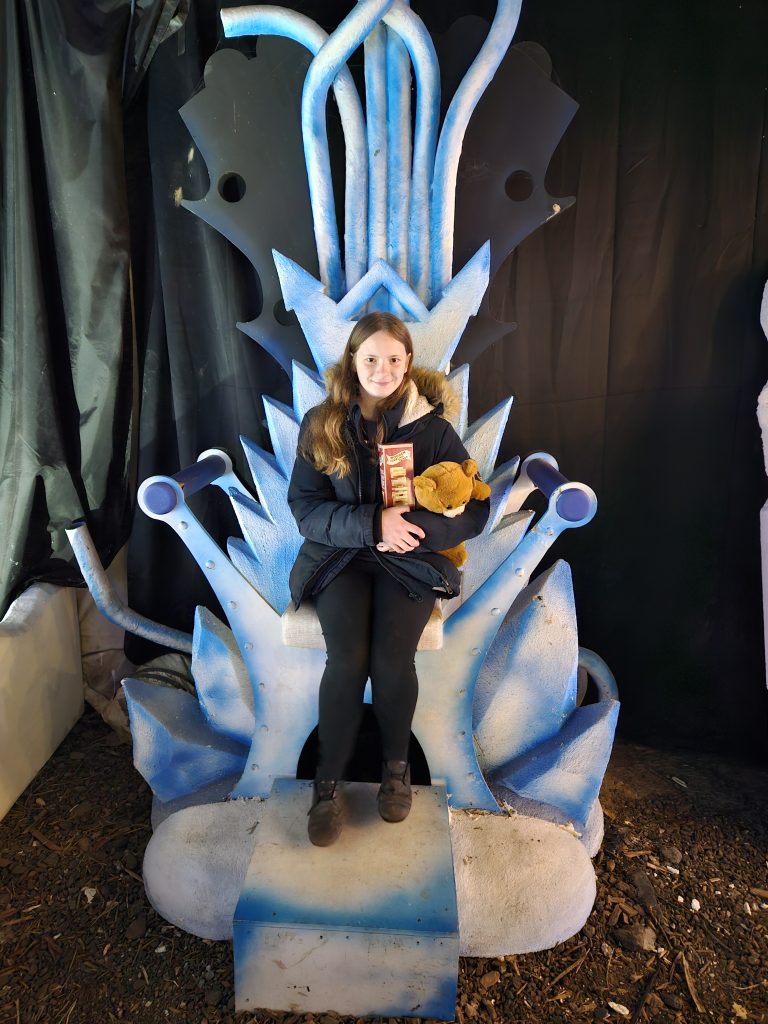 Girl sat on ice throne